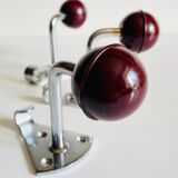 Chrome and bakelite coat hooks from the 70s