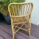 Vintage rattan children's armchair