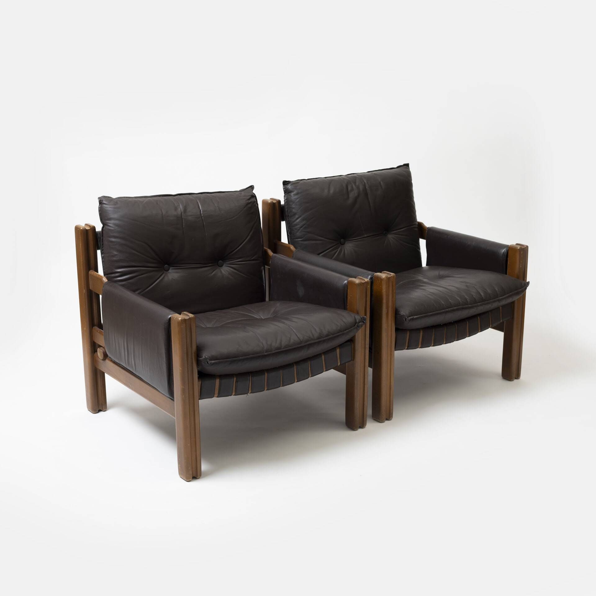 Pair of lounge chairs produced by TON in wood and brown leather, Czechoslovakia, 1990s
