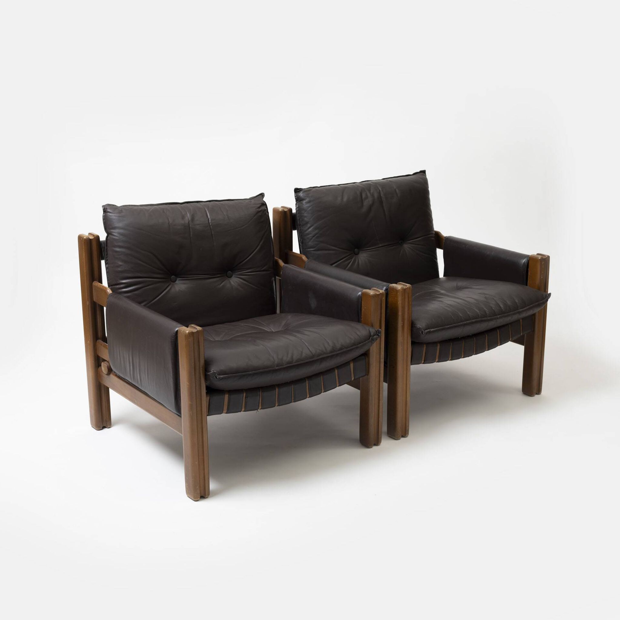 Pair of lounge chairs produced by TON in wood and brown leather, Czechoslovakia, 1990s
