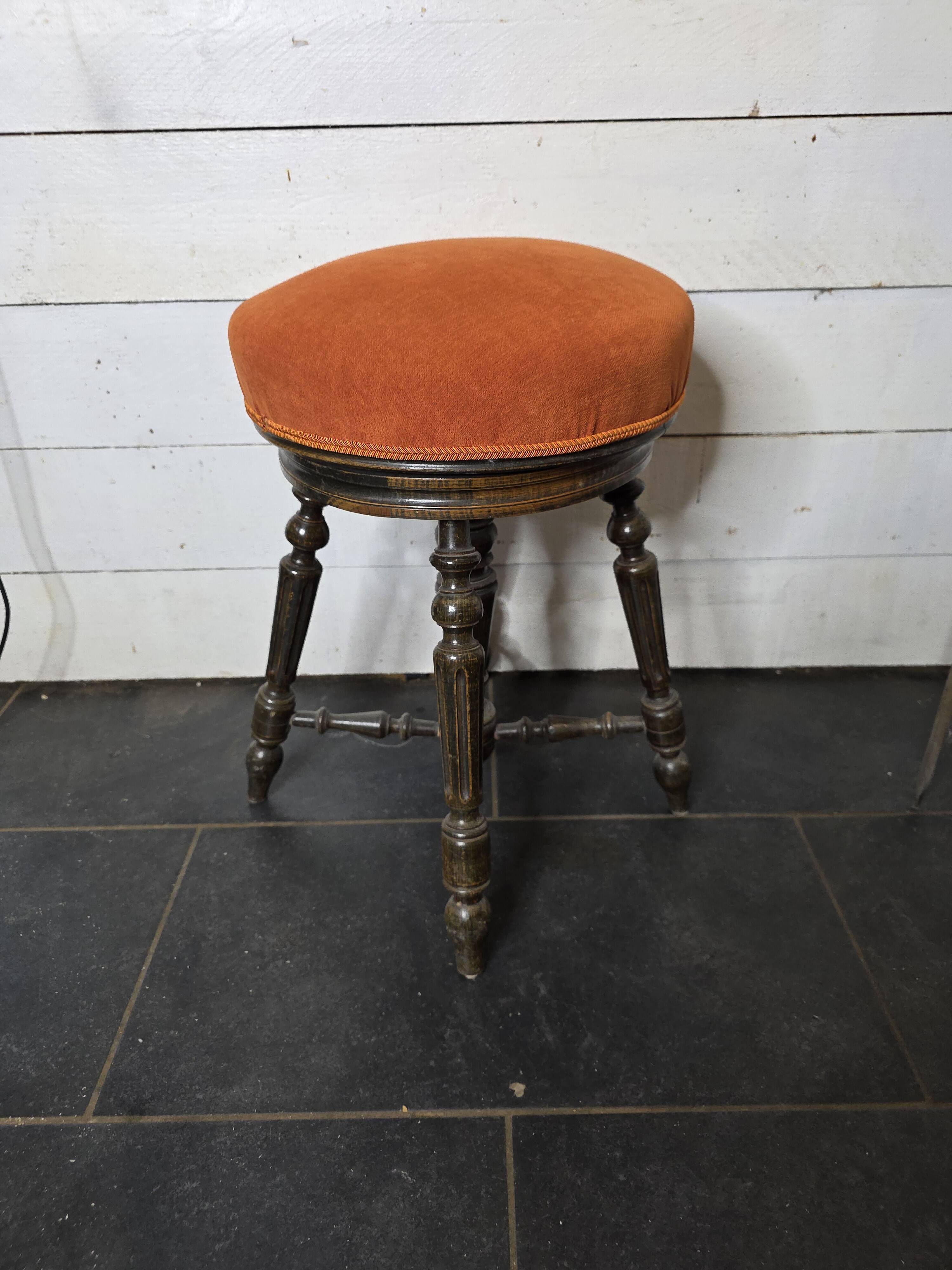 Antique adjustable piano stool