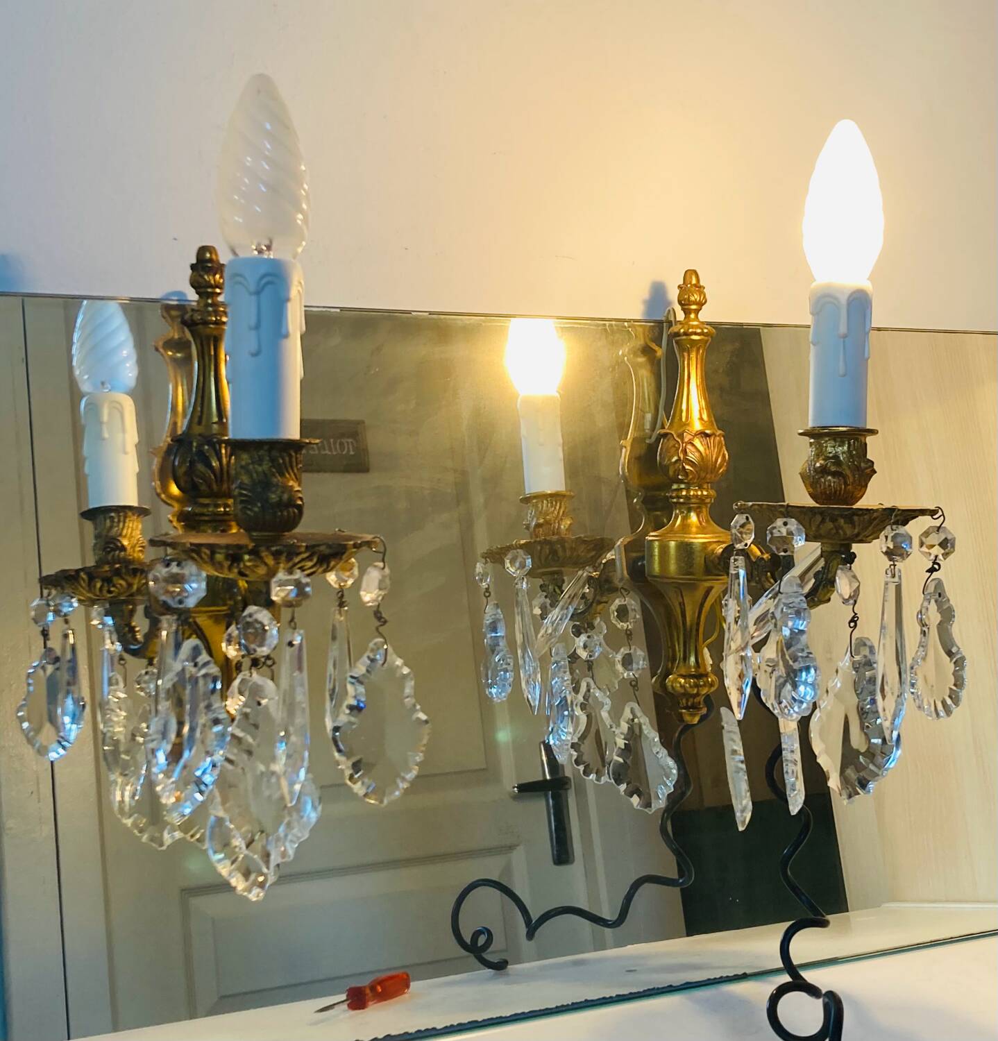 St Louis XV wall lights in gilded bronze with pendants from the mid-20th century.