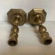 Pair of antique polygonal brass candlesticks
