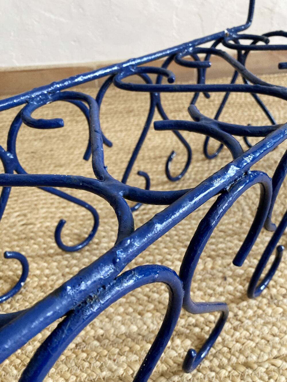 Pair of blue-painted wrought iron planters, 1960s
