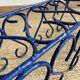 Pair of blue-painted wrought iron planters, 1960s