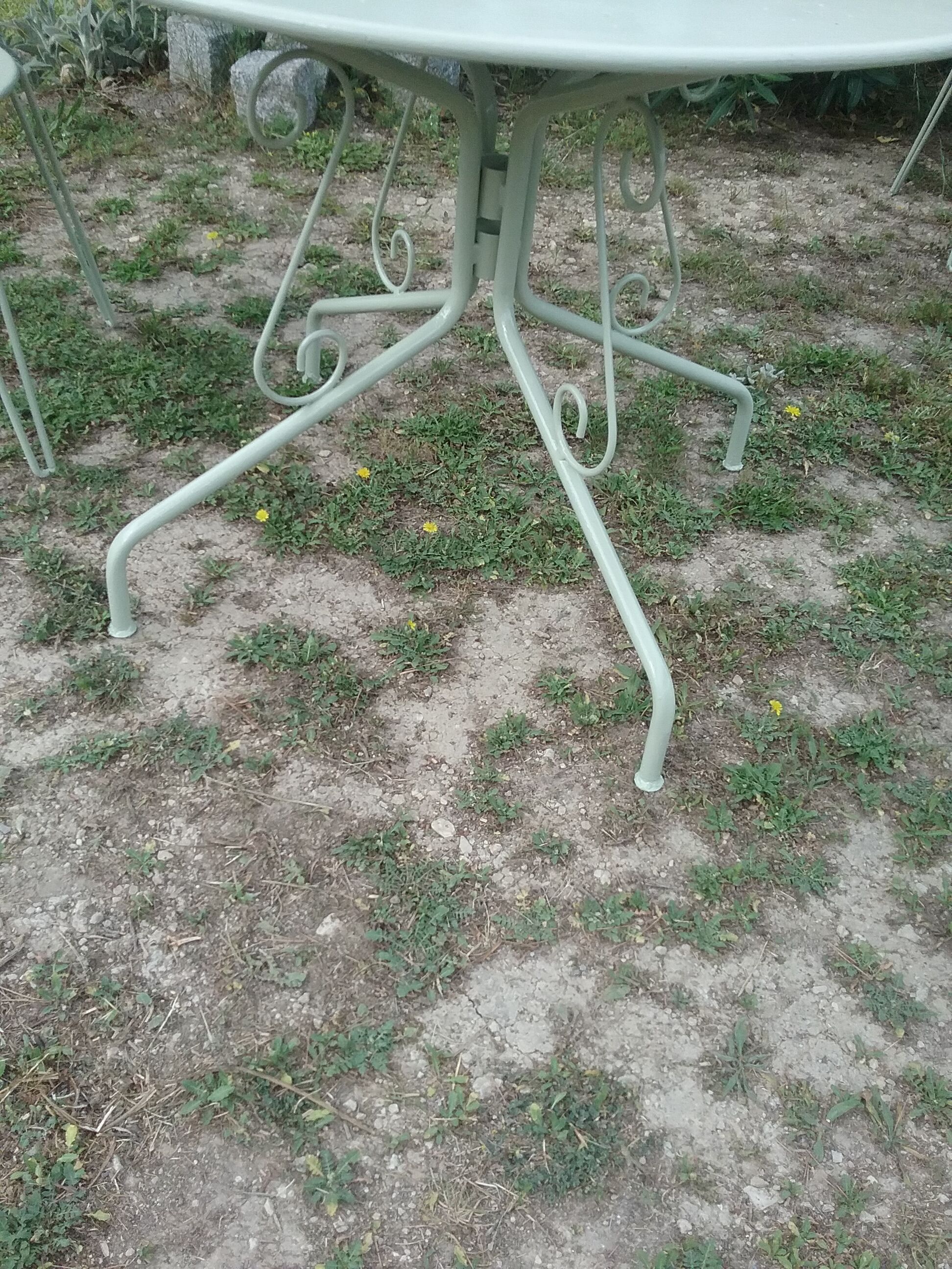 Green wrought iron garden furniture