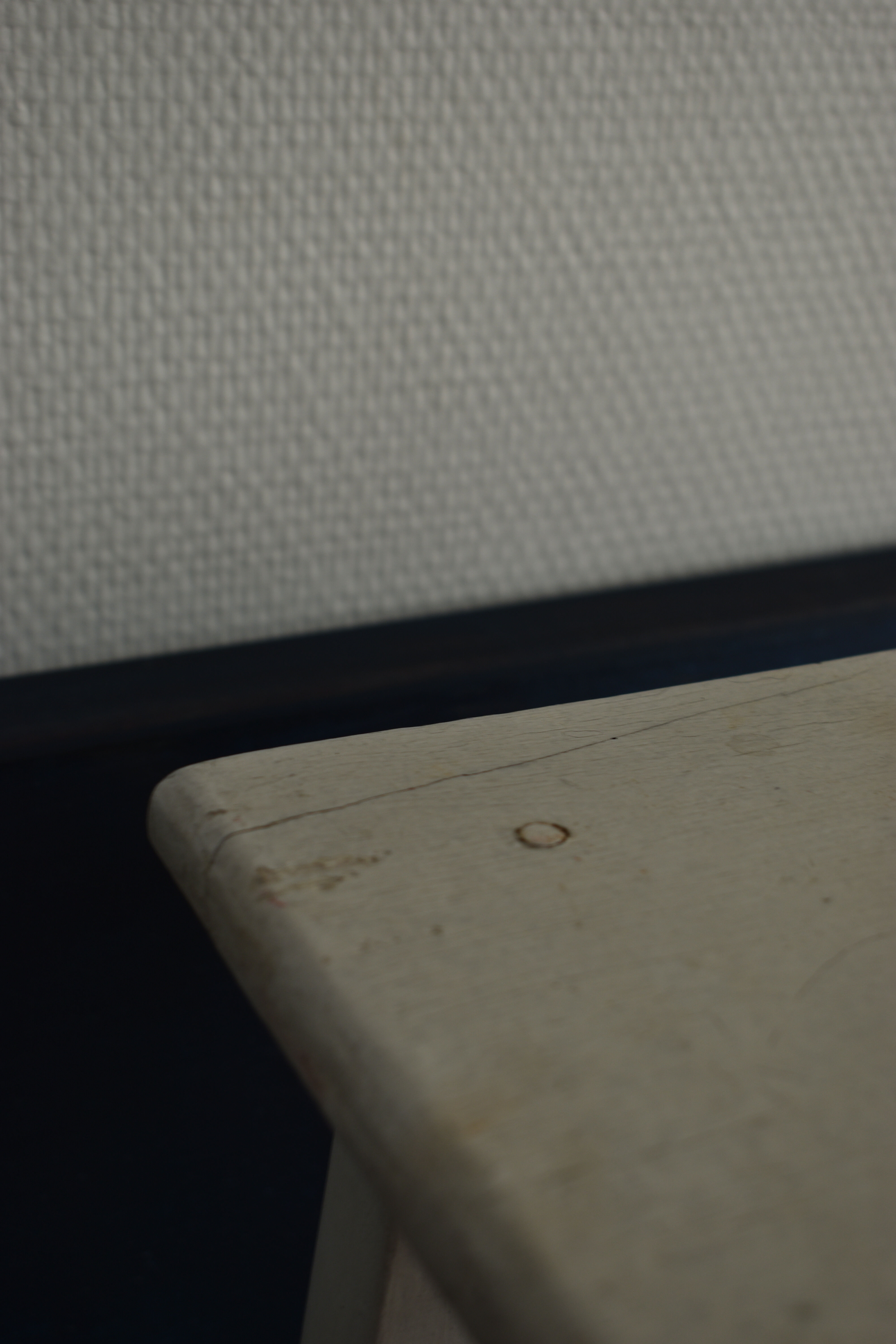 Old white wooden handle stool