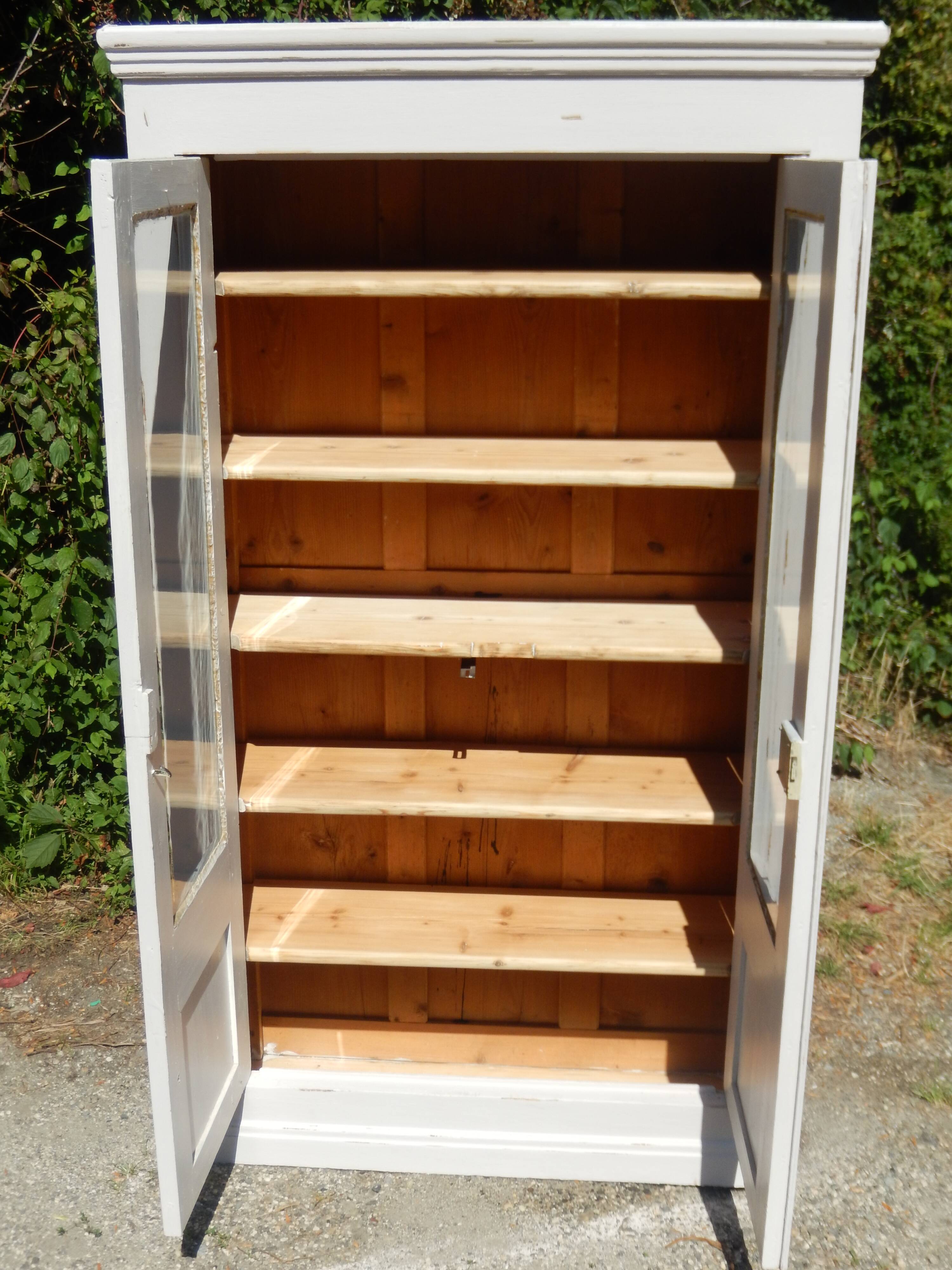 Magnificent old library/display cabinet in fir - white chalk patina.
