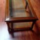 Coffee table in wood, glass and rattan