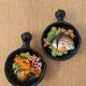 Two trompe l'oeil ceramic casseroles