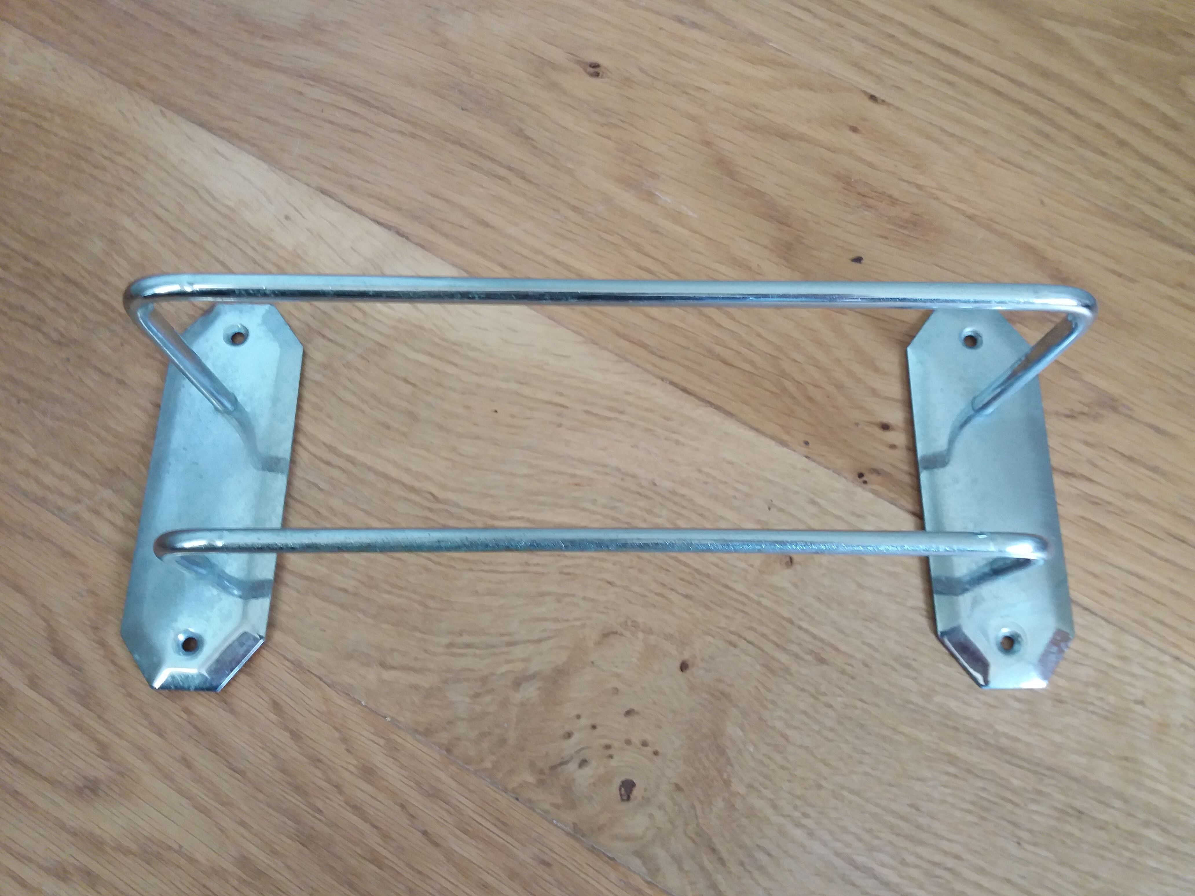 Chromed copper towel rack