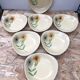 Set of 7 antique St. Clement Sirius pattern ceramic plates
