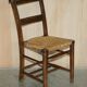 Set of six Dutch oak chairs with woven straw seats, circa 1860.