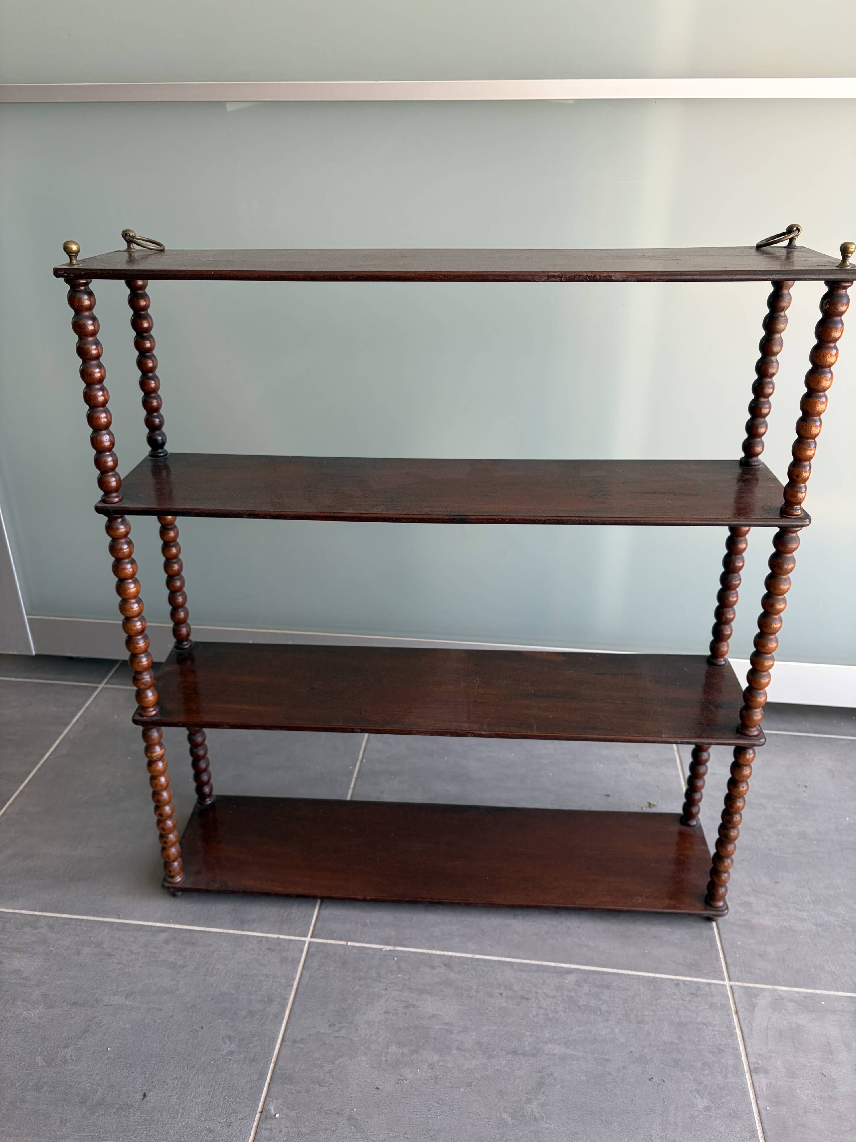 small varnished wooden shelf
