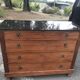Commode pates de lion retour d'égypte