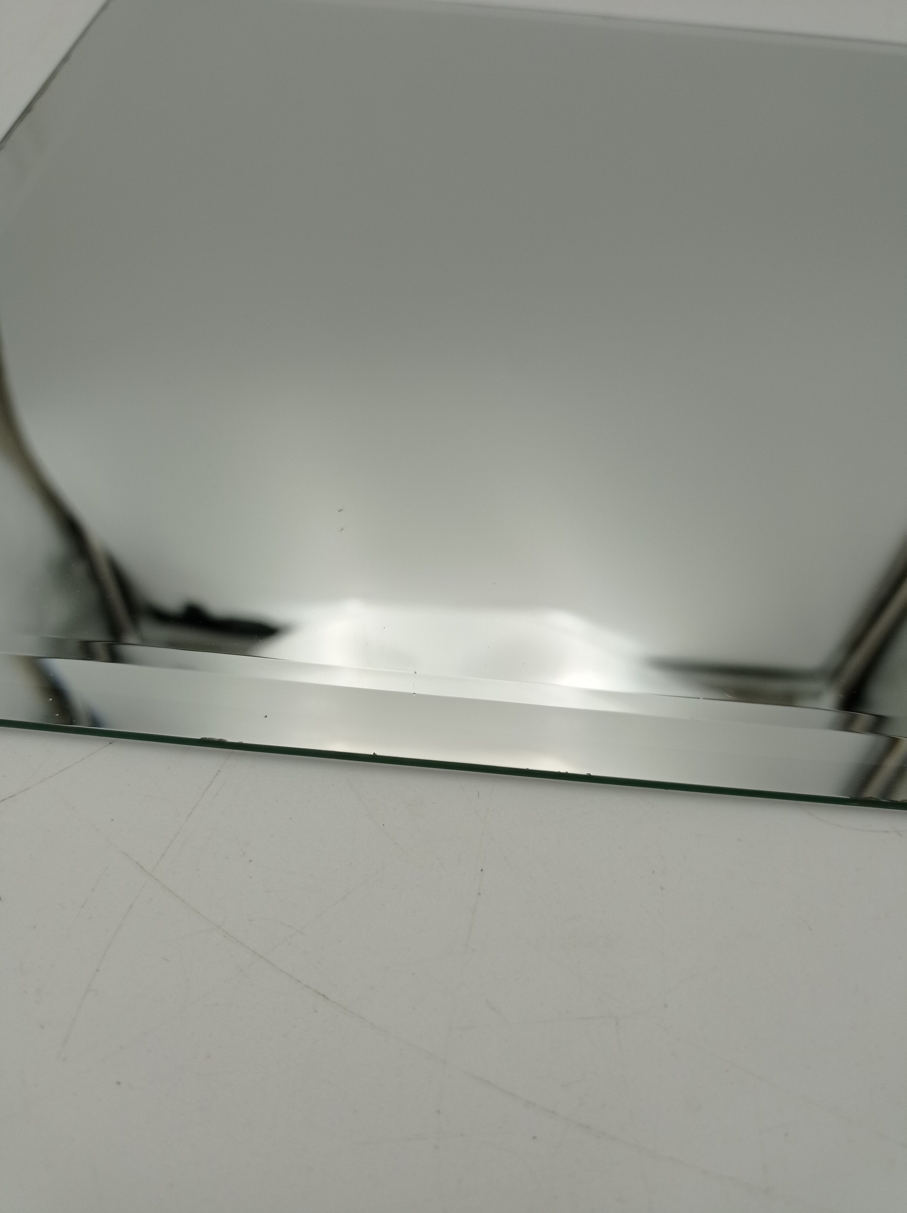 Beveled mirror 35x25 cm