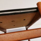 Danish designed footstool, in teak and black skai. Made at Spøttrup furniture factory in the 1960s.