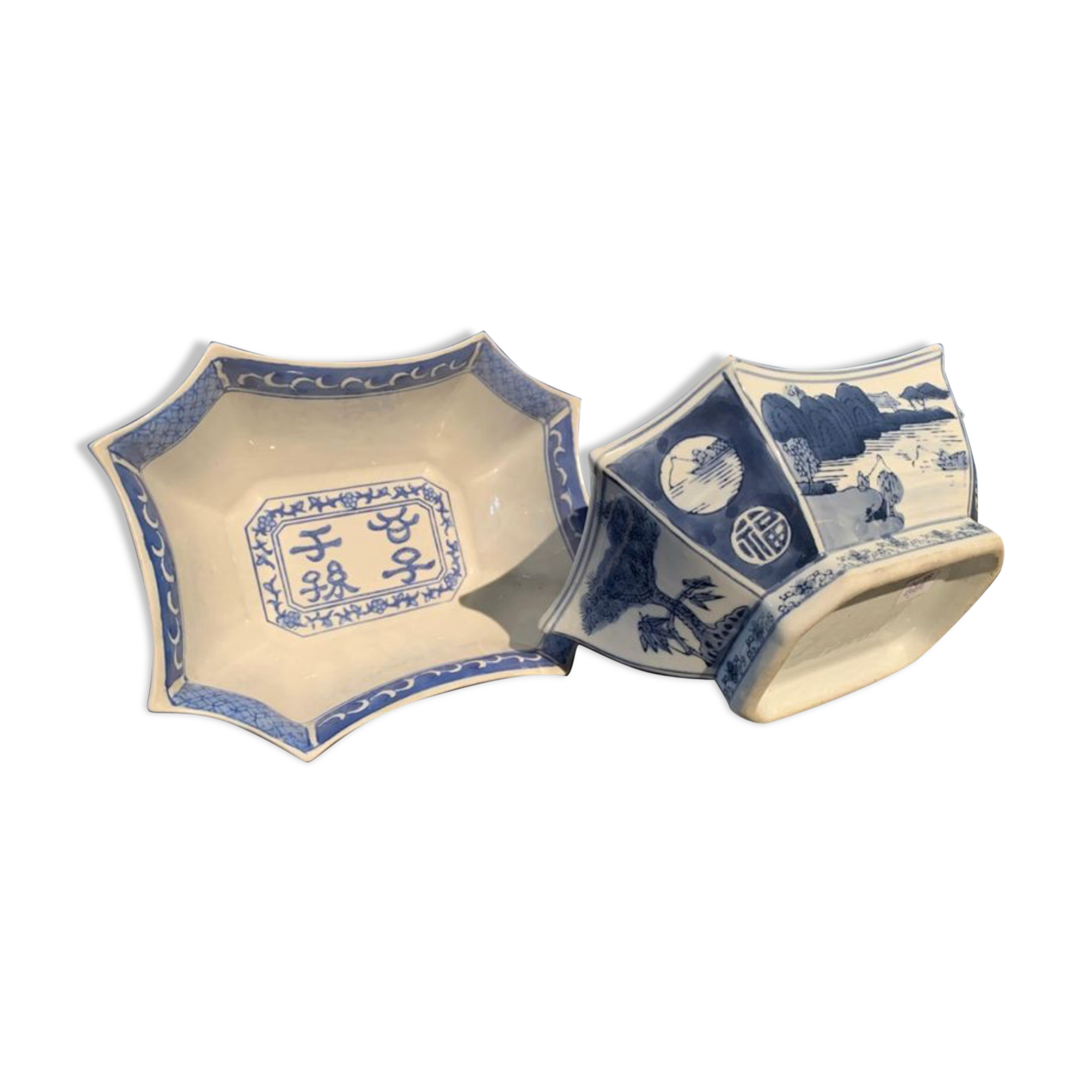 Suite of 2 porcelain jattes decorated with blue white decoration of landscapes and ideograms in reserve