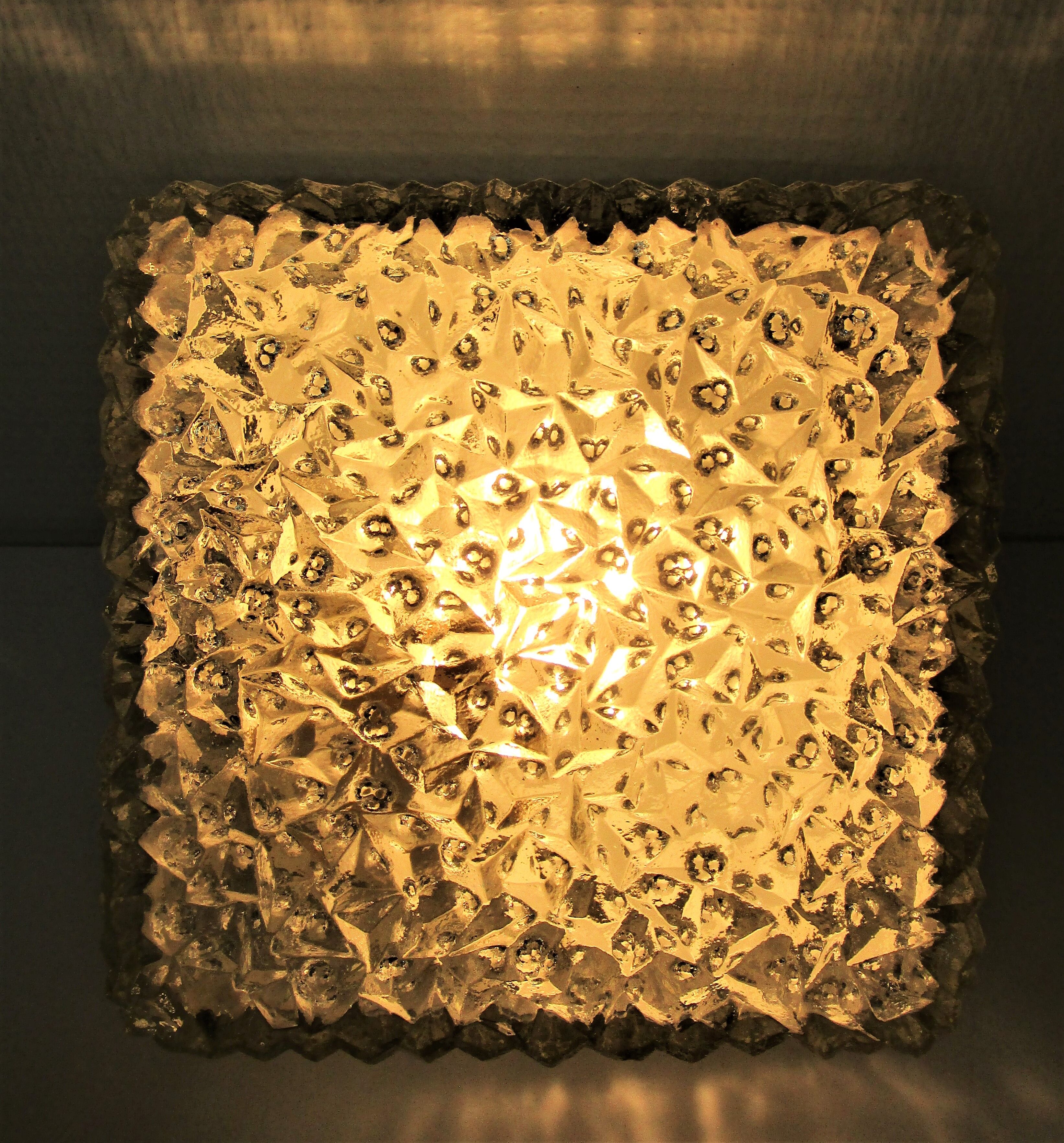 Holophane brand square wall light in moulded thick glass