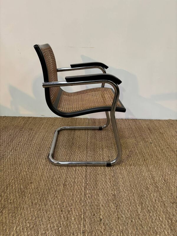 Fauteuil style Marcel Breuer assise moulée cannage