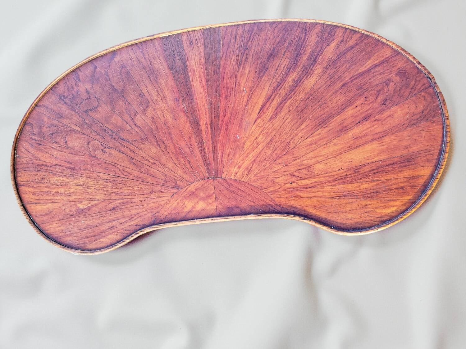 Small kidney-shaped piece of furniture from 1920.