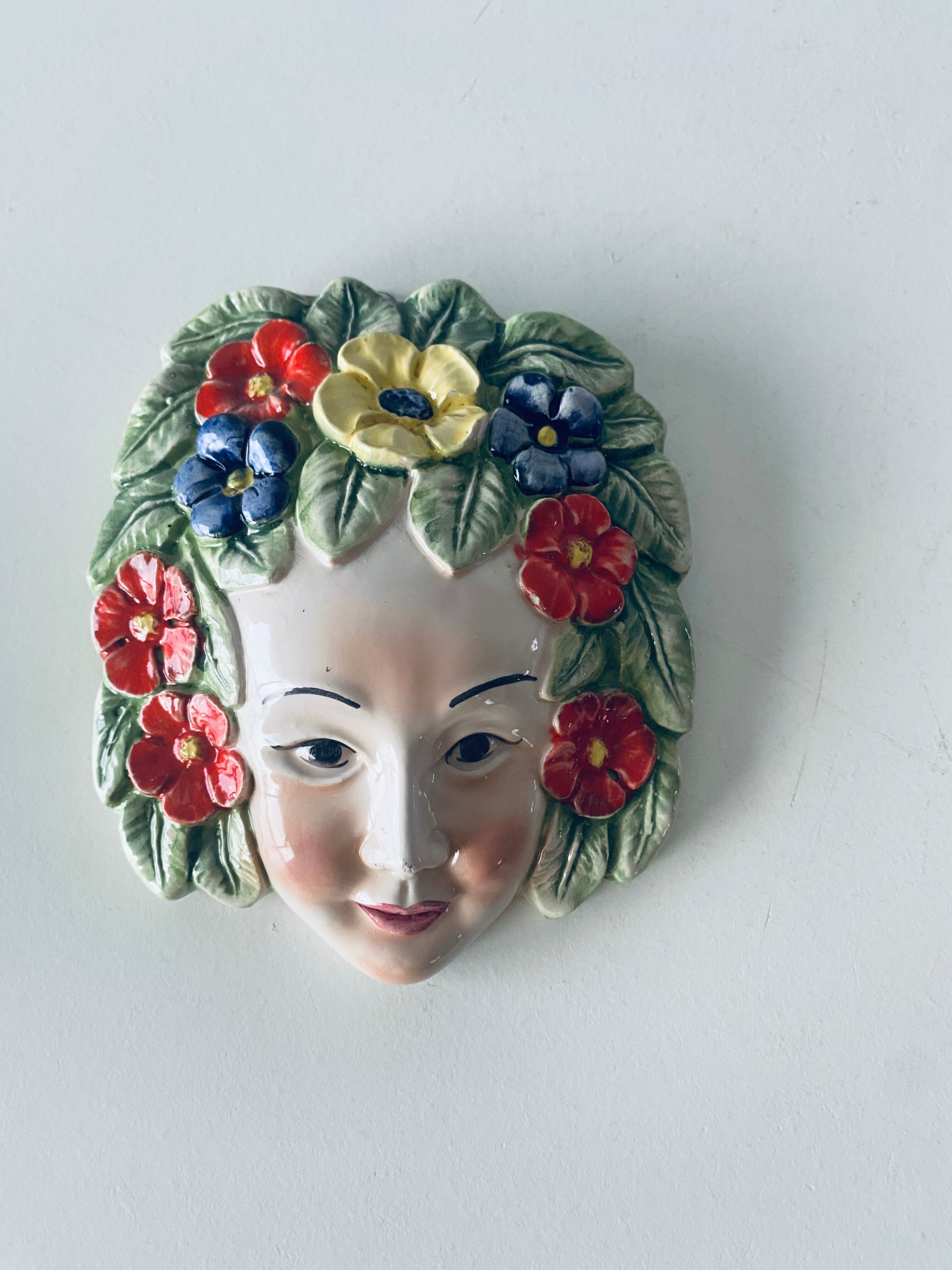 Ceramic wall face signed Il Falco