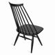 The Mademoiselle armchair designed in the 1950s by Ilmari Tapiovaara for Artek