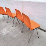 Orange plastic chairs