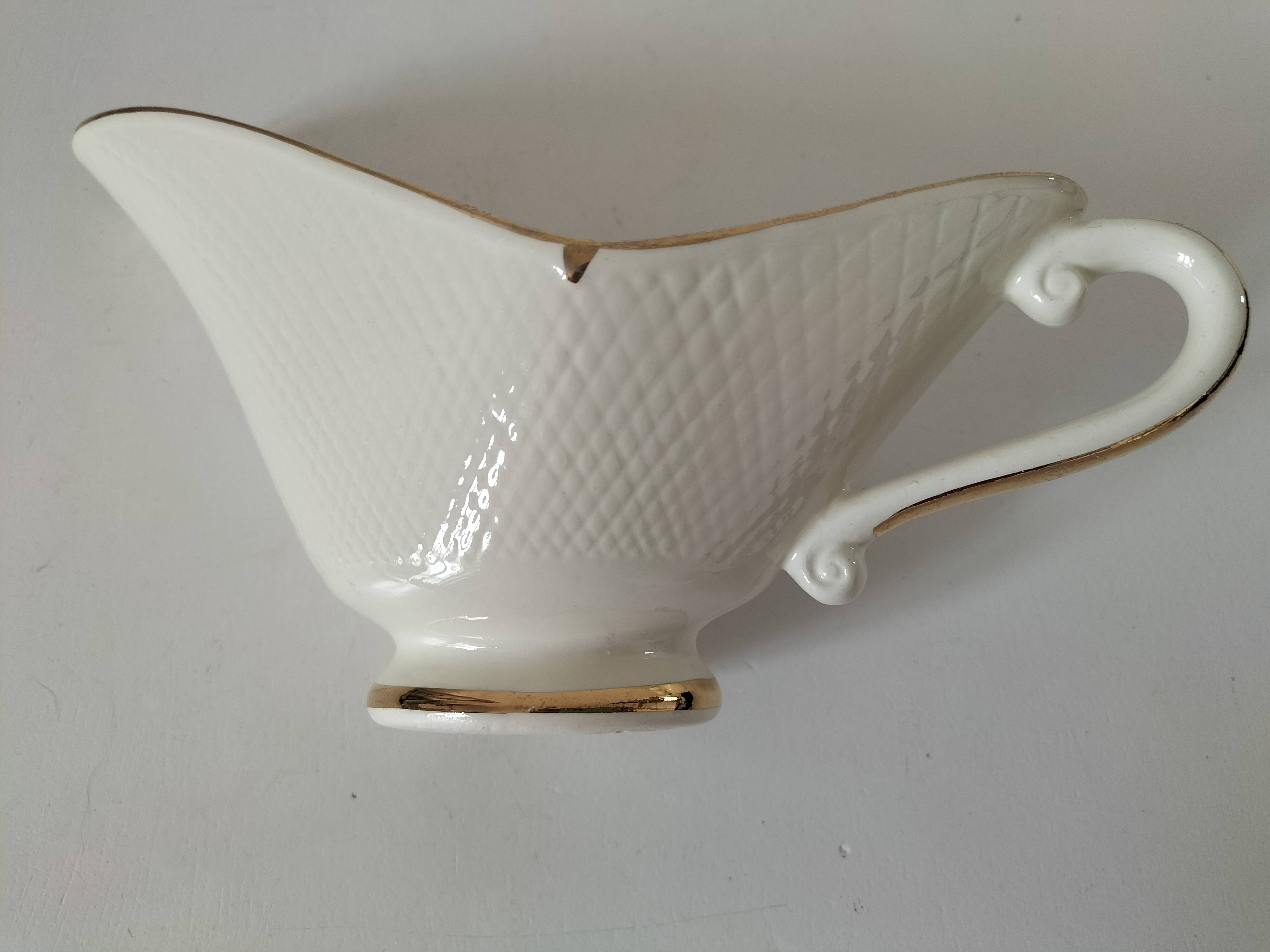 Sauceboat Salins France stylised floral decoration