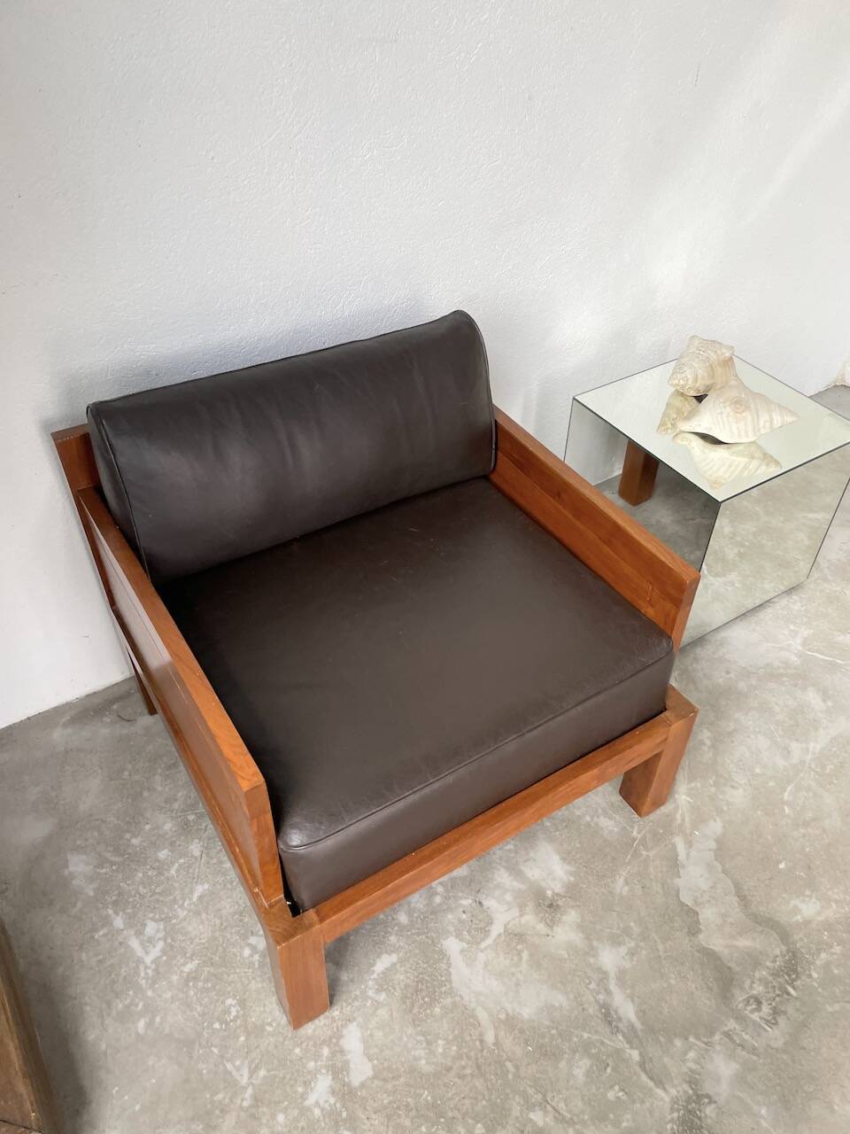 Modernist armchair in exotic wood and leather