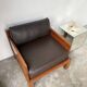 Modernist armchair in exotic wood and leather