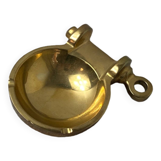 Brass ashtray in the shape of a boat shackle