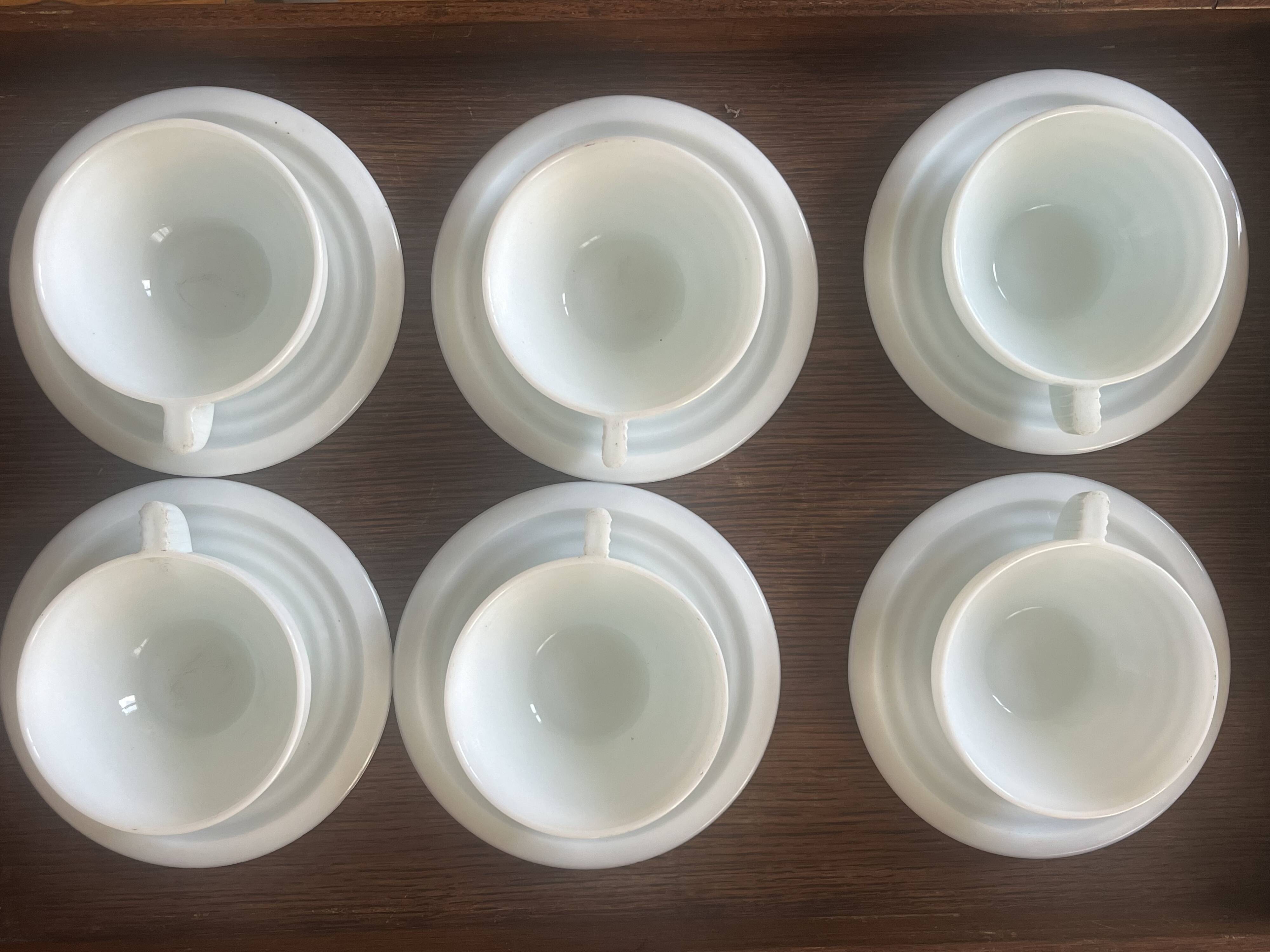 Set of 6 opaline Art Deco cups and 6 saucers.