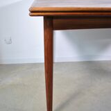 Extendable rosewood dining table year 60