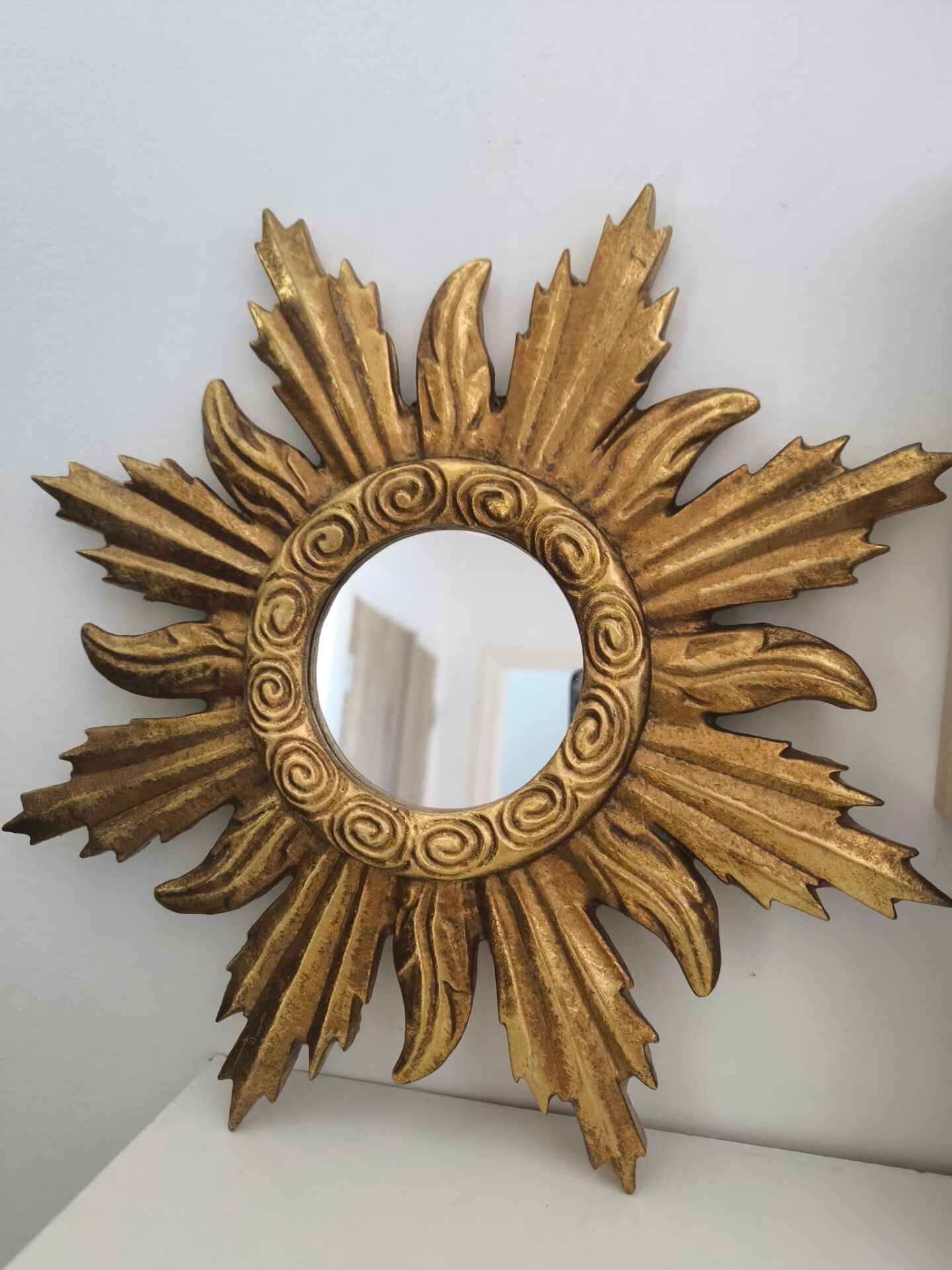 Miroir soleil doré