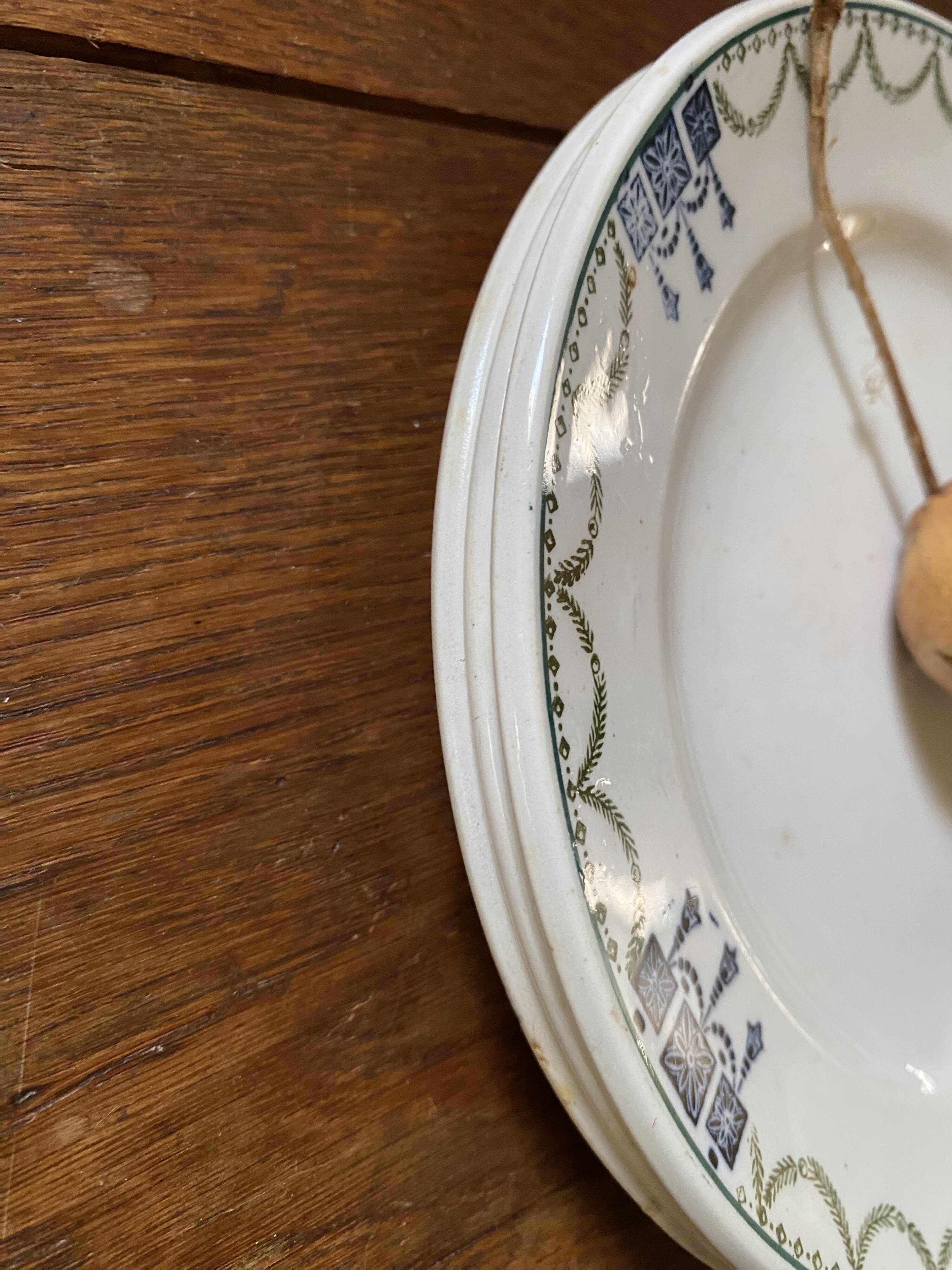3 dessert plates stamped in art deco style.