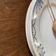 3 dessert plates stamped in art deco style.