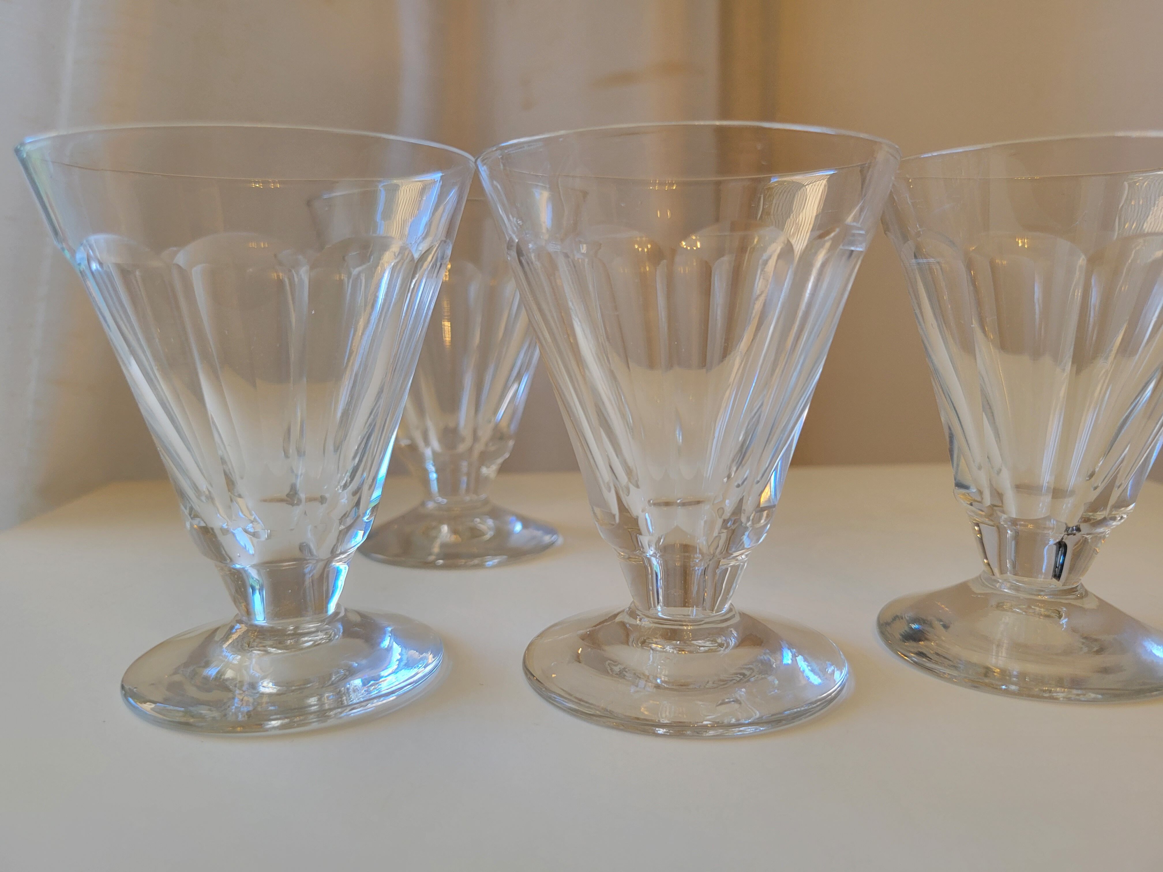 4 old conical liquor glasses cut with 10 flat ribs with faceted sides