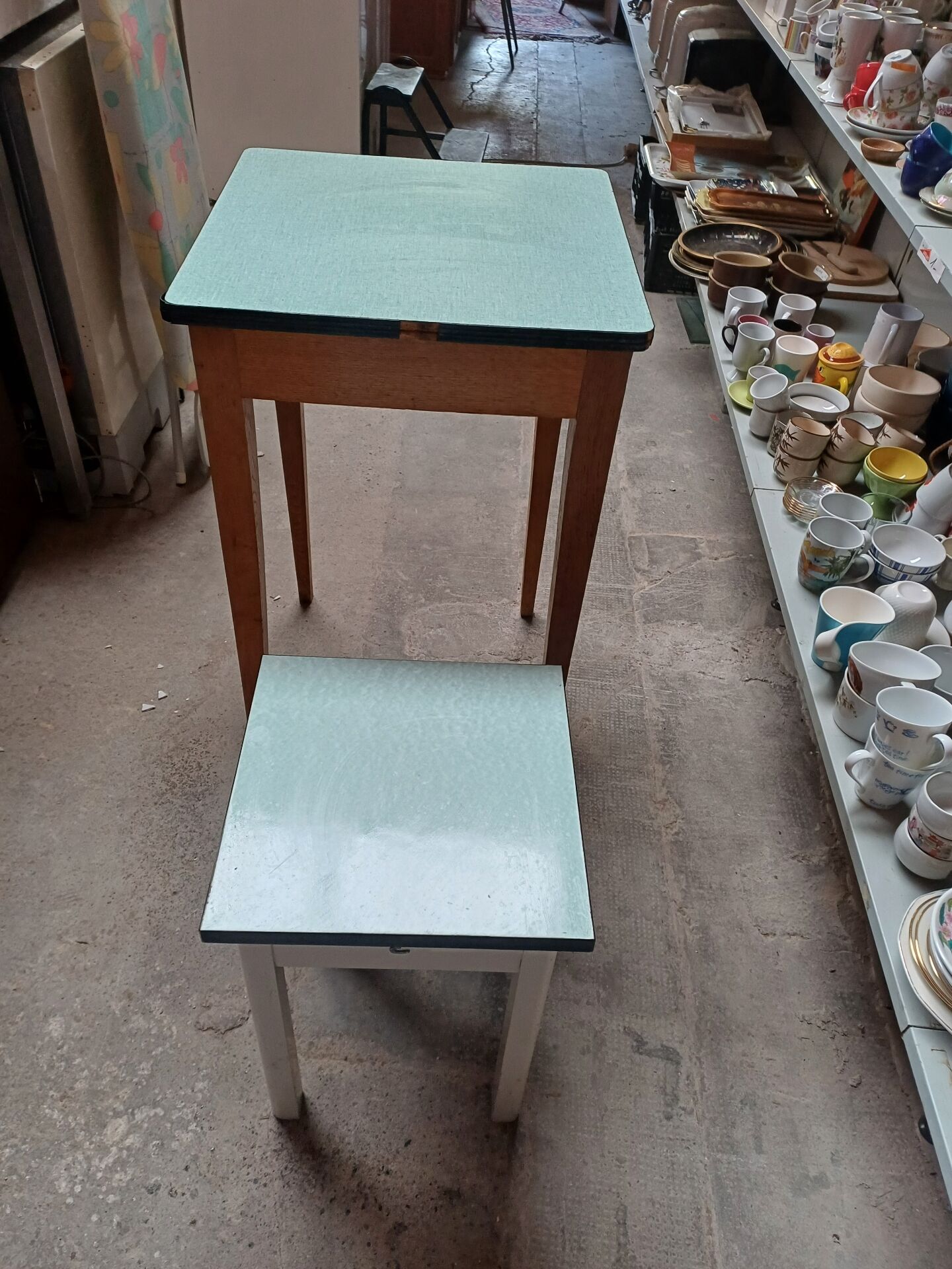 Formica table with tapered wooden legs + stool
