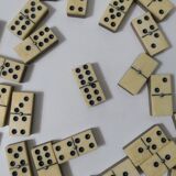 Antique set of dominoes made of bone and wood