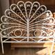 Rattan headboard & white wicker peacock tail décor 50-60s