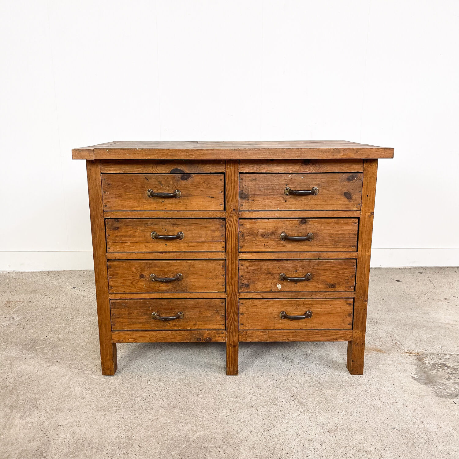 Vintage industrial wooden workbench with drawers
