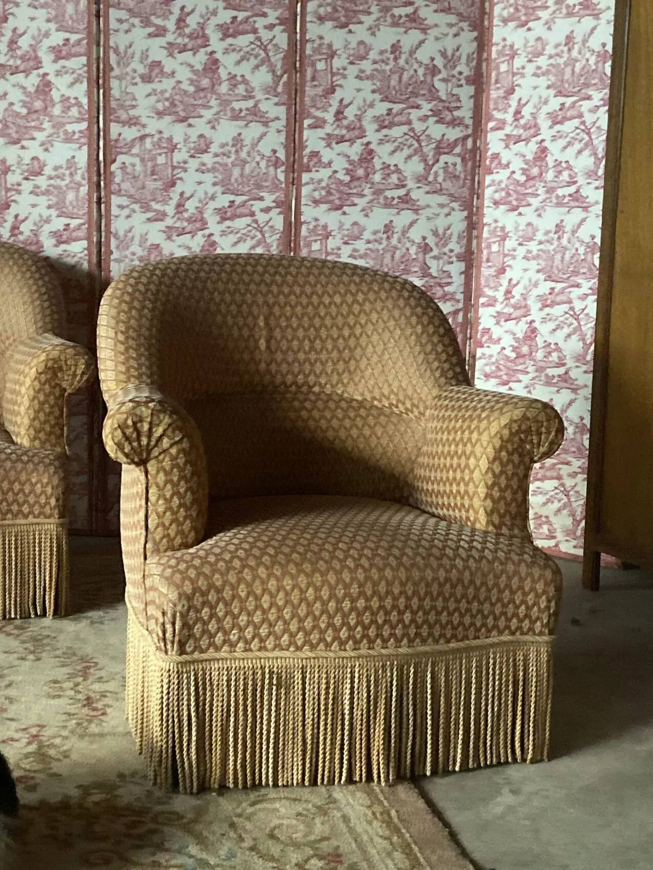 Pair of renovated upholstered frog chairs in beige velvet.
