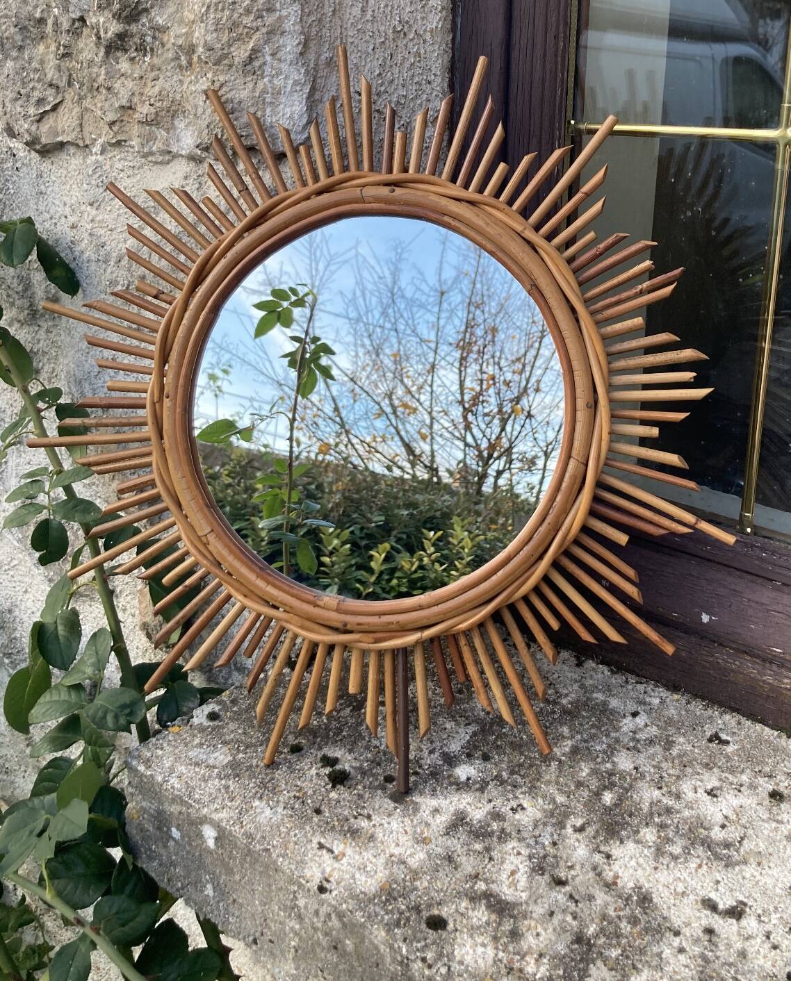 Vintage rattan sun mirror