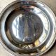 Round silver-plated metal dish