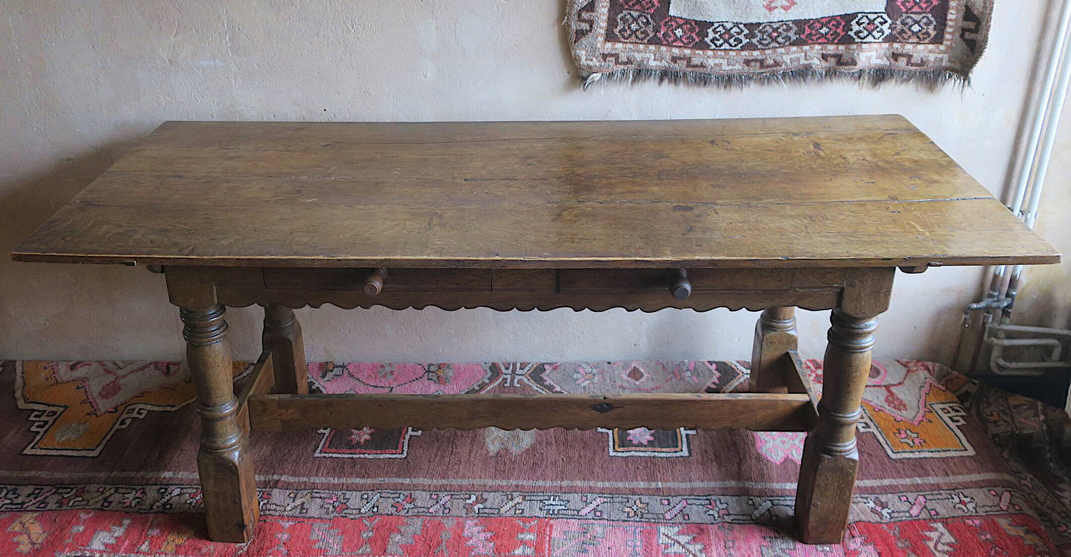 Antique patinated oak dining table, 18th century