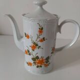 Vintage coffee pot Winterling Bavaria with orange floral decoration.