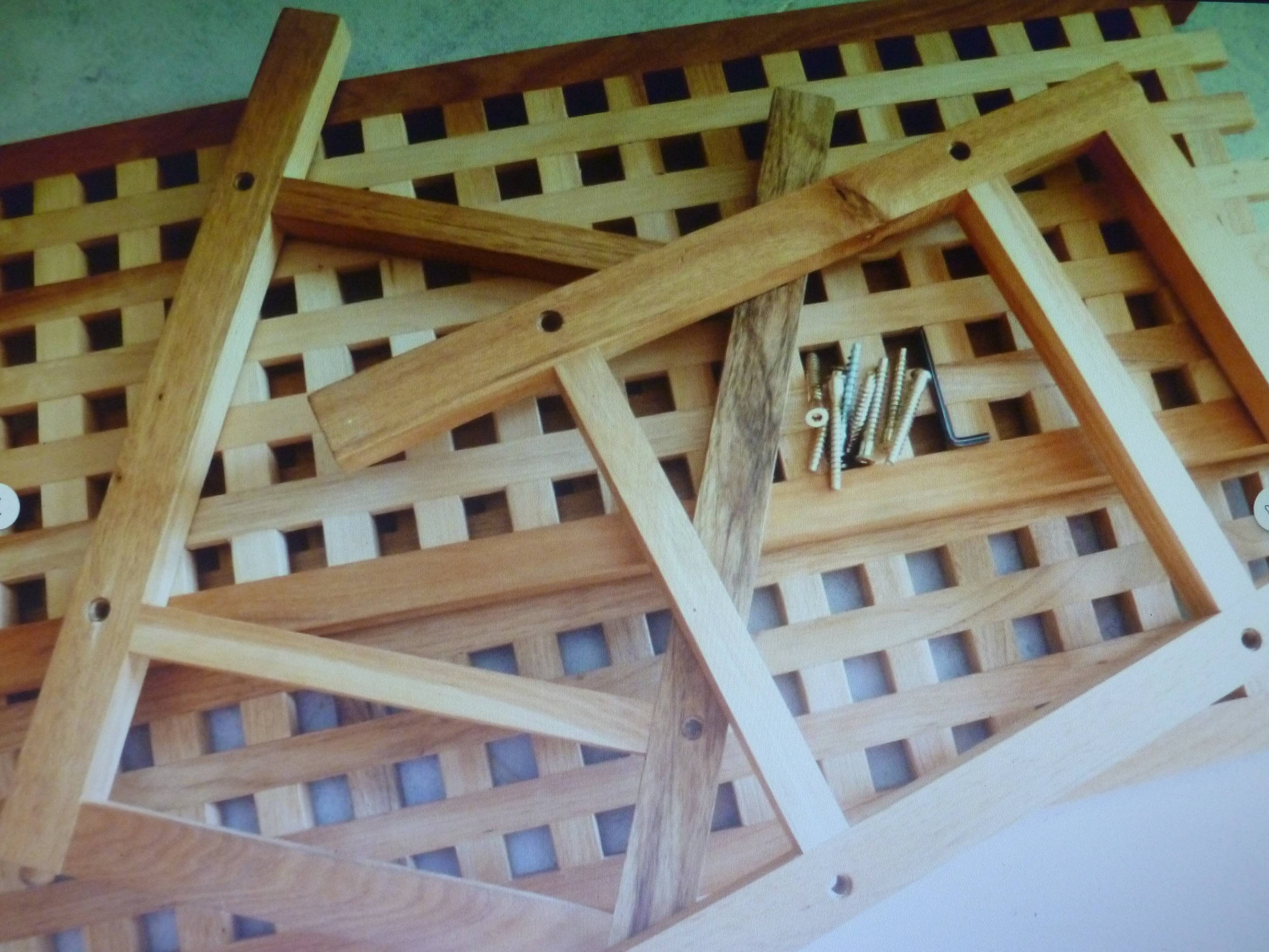 Wooden coffee table with openwork shelves and garden plant holder.
