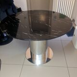 Round designer table in marble and metal