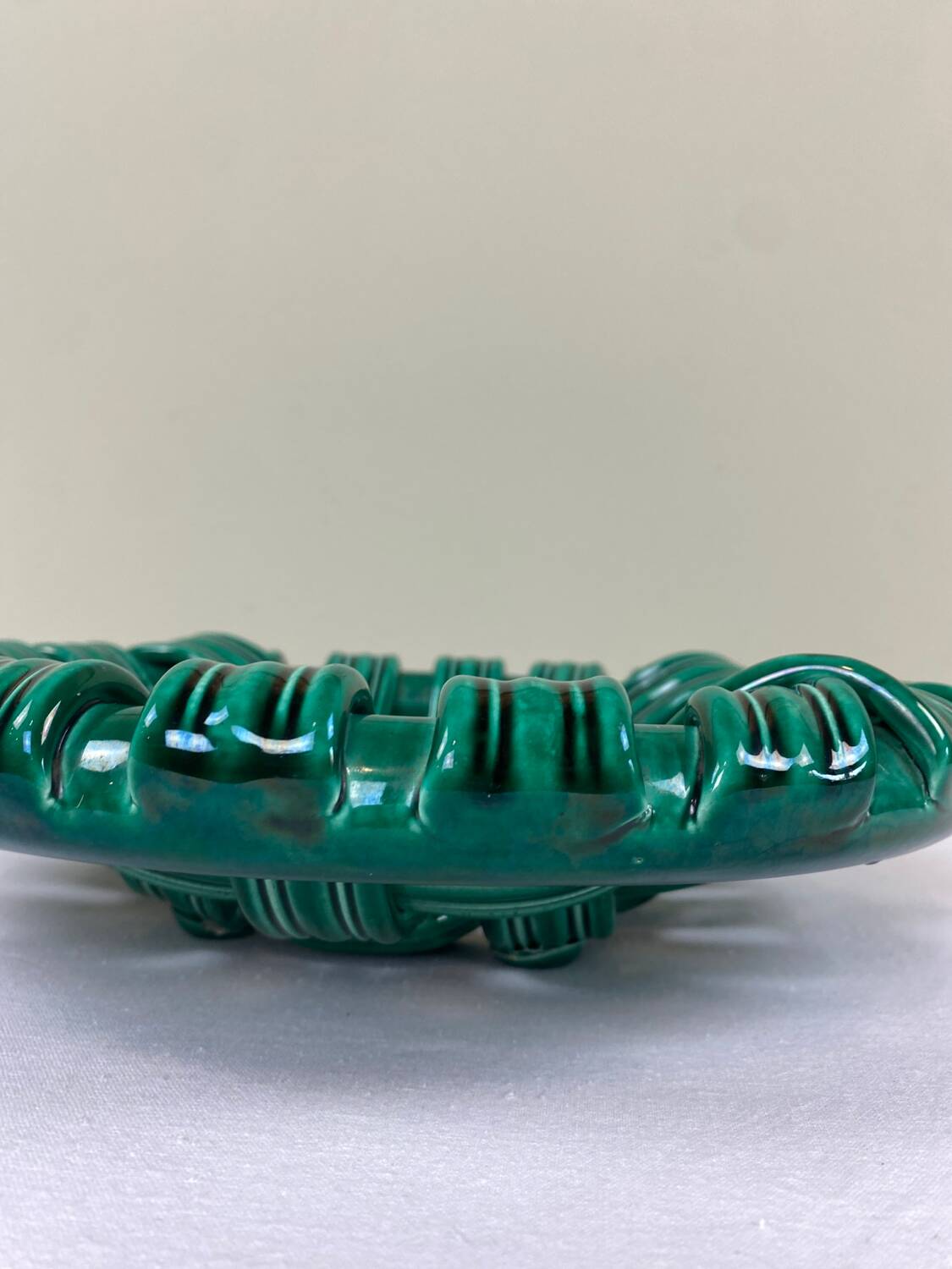 Braided ceramic cup